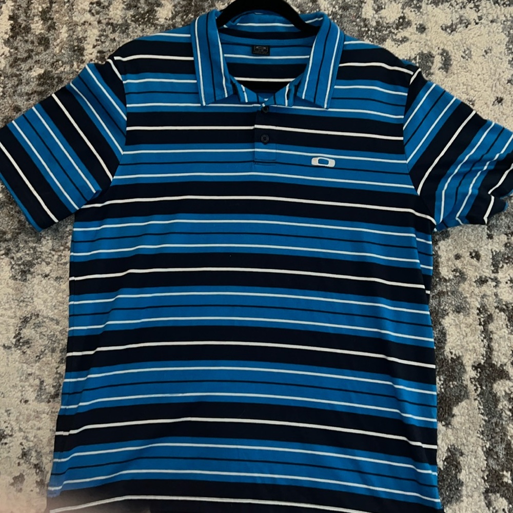 Oakley collar shirt! Excellent condition. No stains or tears.